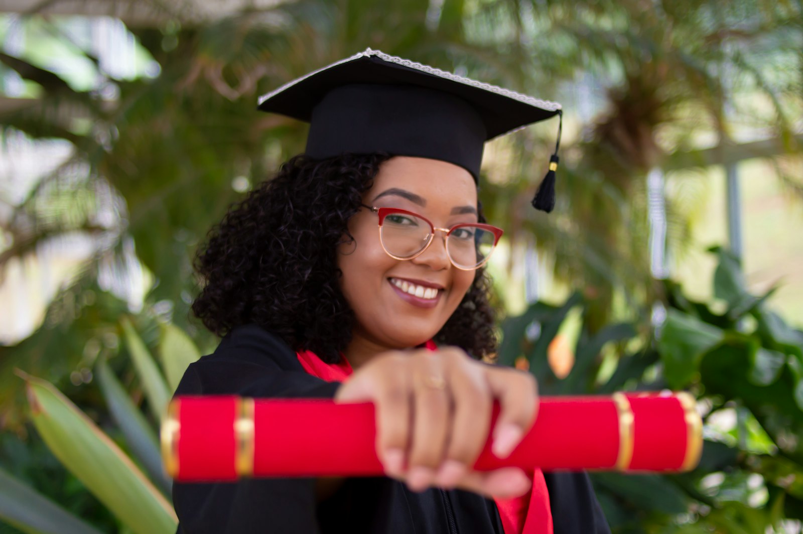Aga Khan Foundation Scholarships 2027 – African graduate student in cap and gown