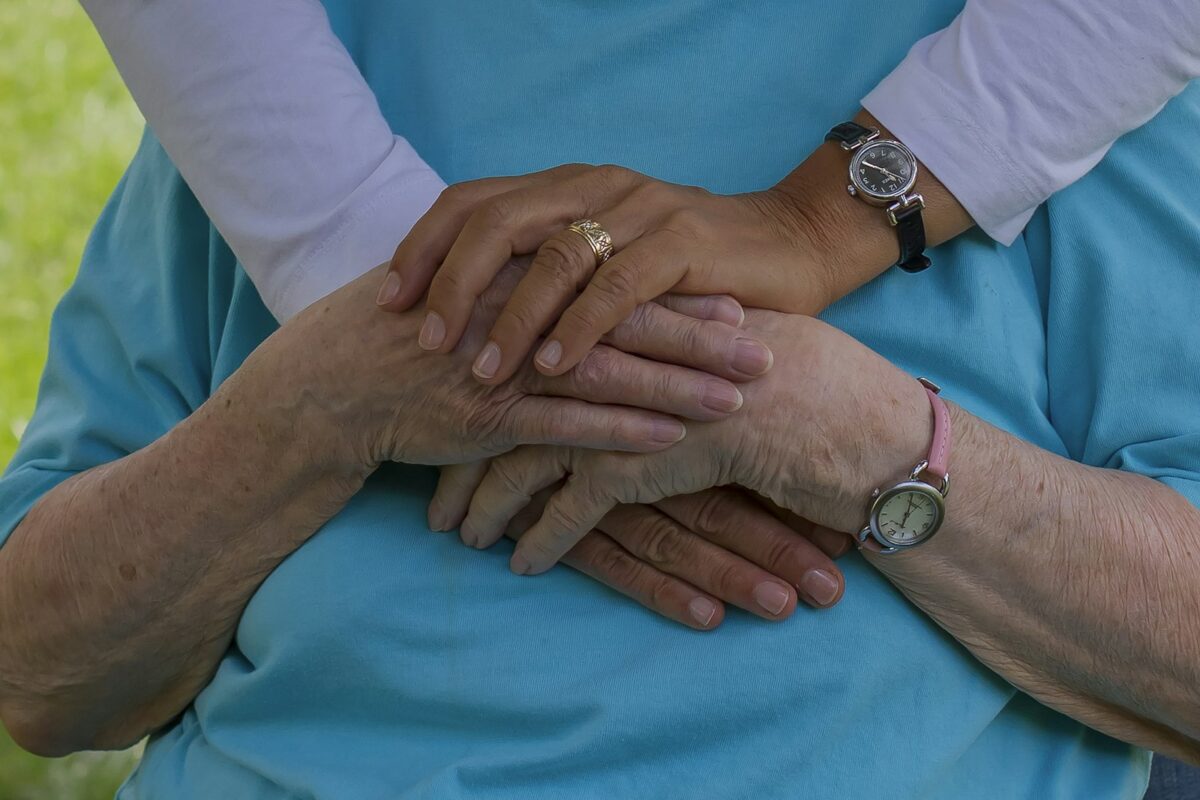 Canada Caregiver Pilot 2026 closing — caregiver with patient