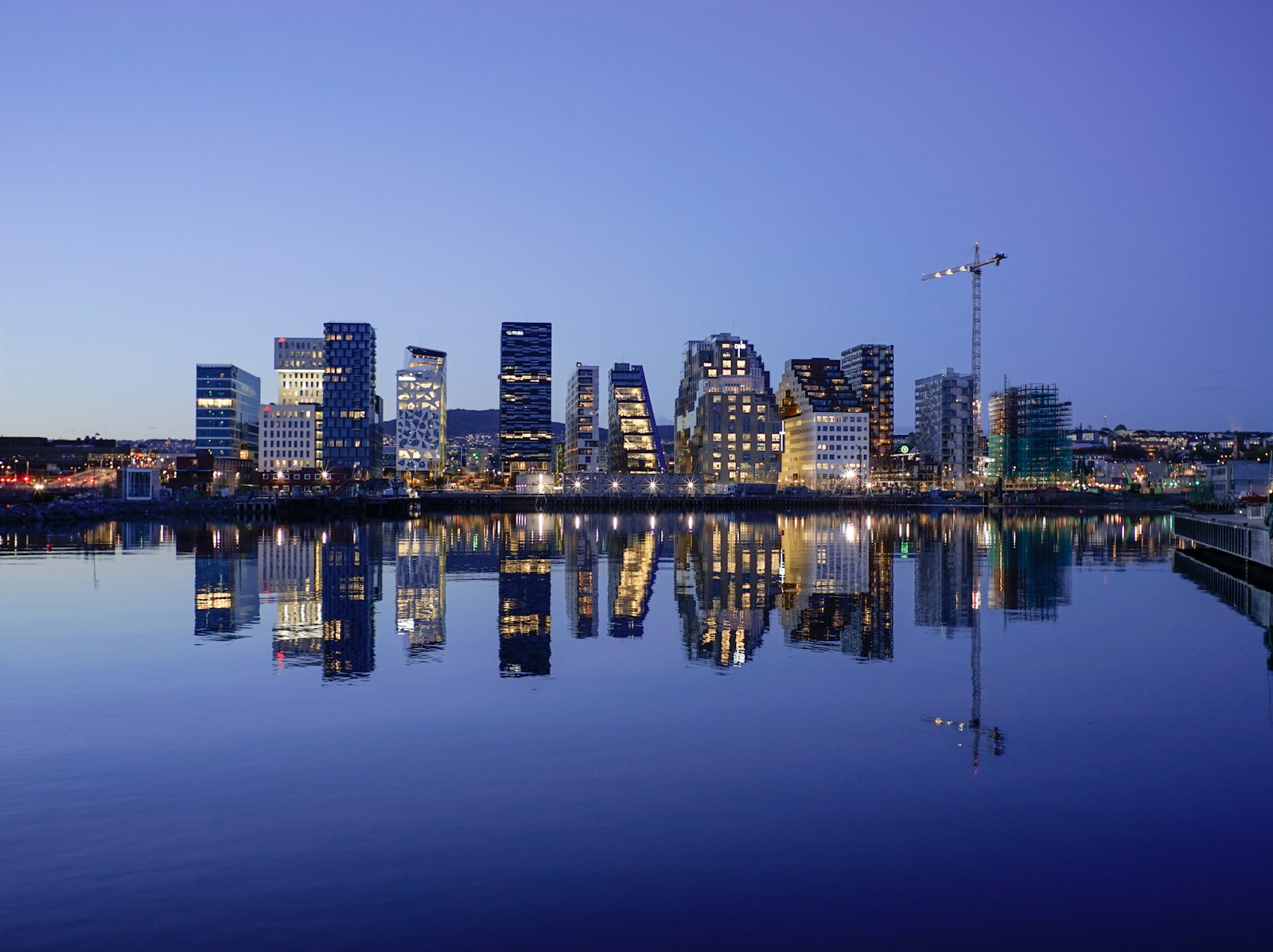 Norway Skilled Worker Visa 2026 Oslo skyline African engineers and nurses