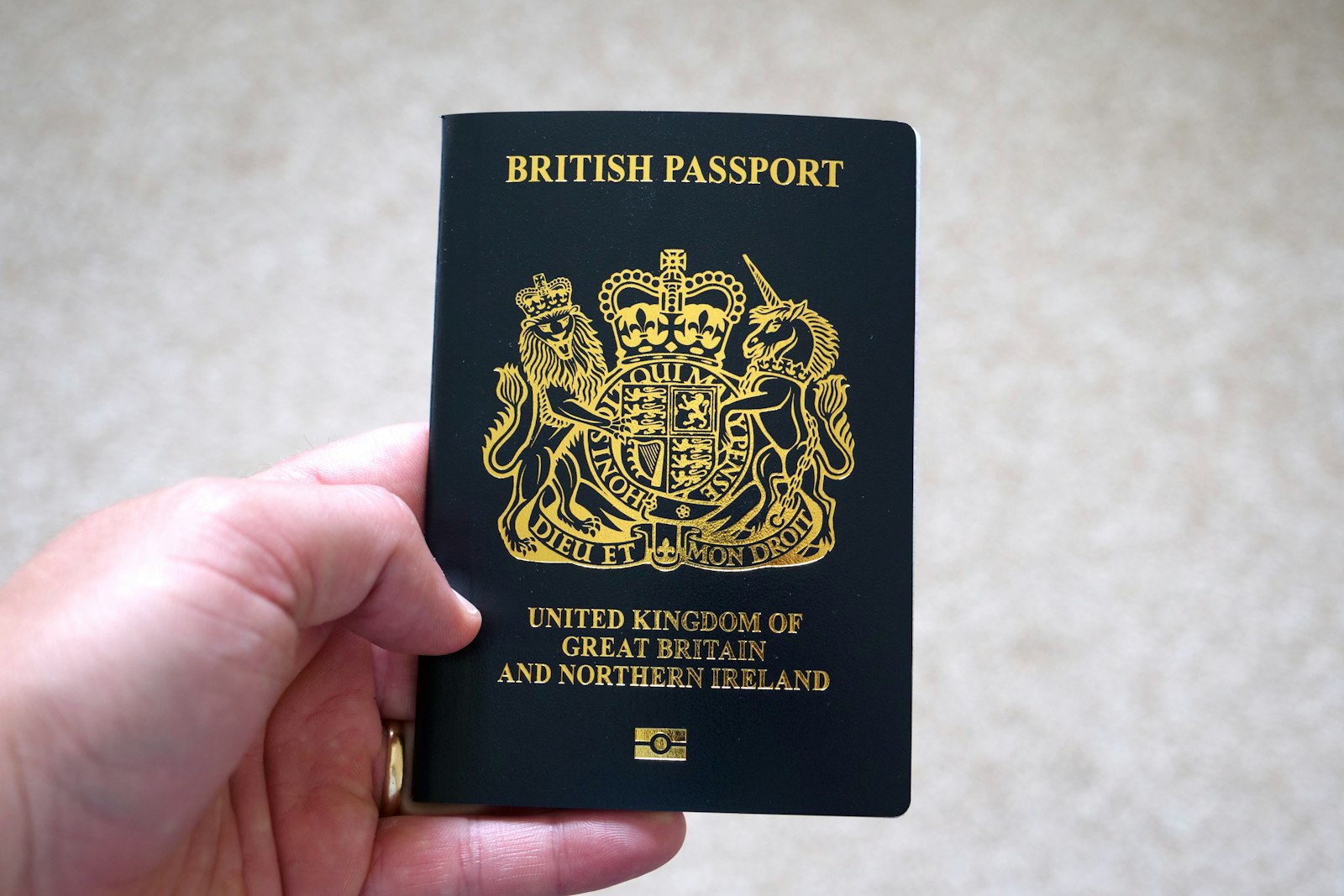 UK Skilled Worker Visa 2026 passport and pen on application form