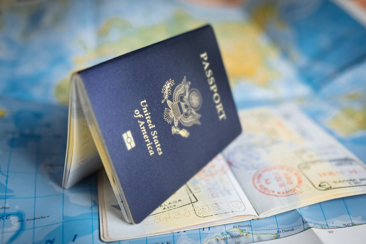 US immigrant visa pause 2026 stamped passport and consulate notice