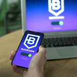 CoinCola first trade bonus illustrated by a mobile crypto transfer on a smartphone