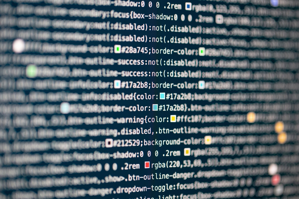 Code on a screen representing software results behind the Adobe CEO transition