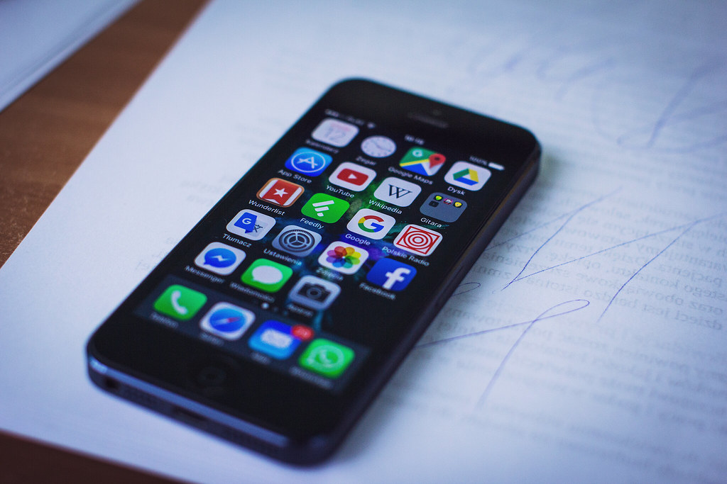 Phone screen with apps affected by the ChatGPT DSA designation