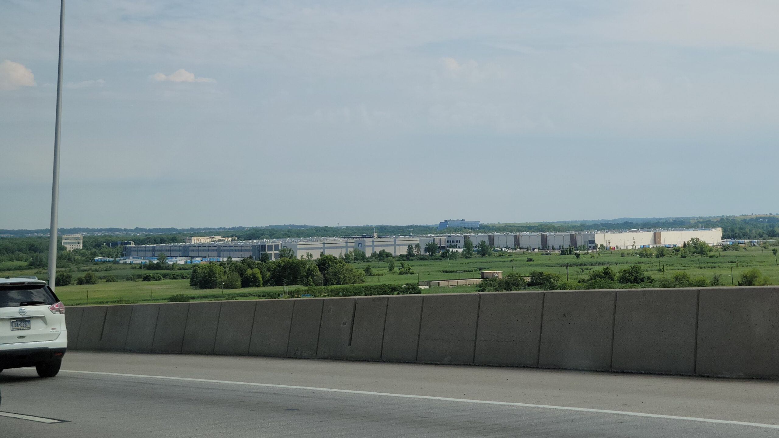 Amazon fulfillment center exterior linked to the FTC Amazon advertiser overcharging case