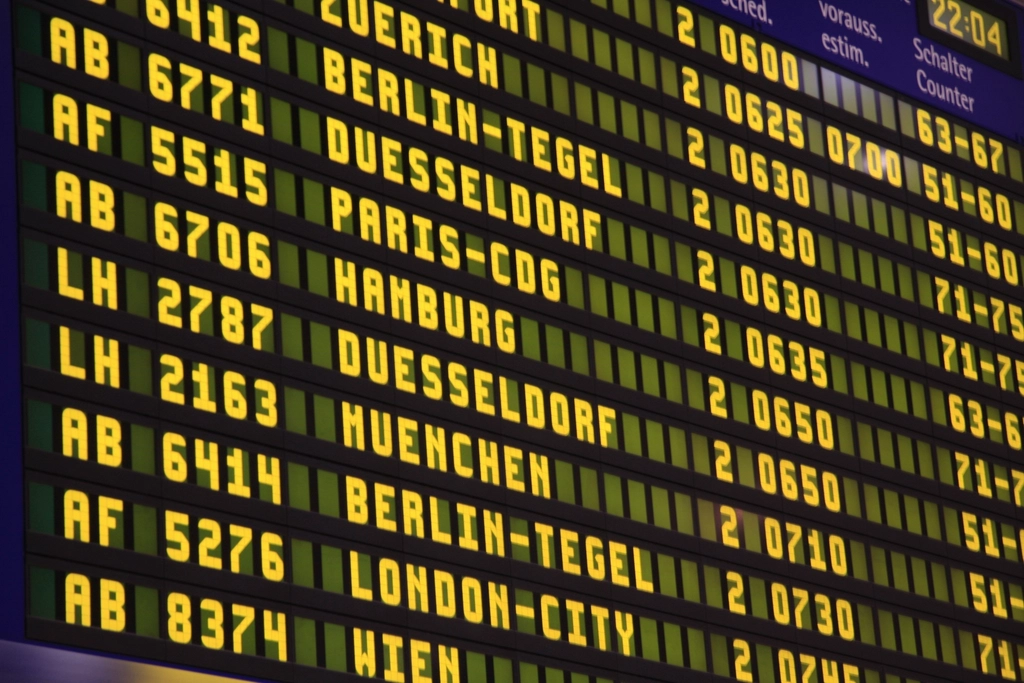 Airport departure board reflecting disruption from the Iran aviation sanctions flights fallout
