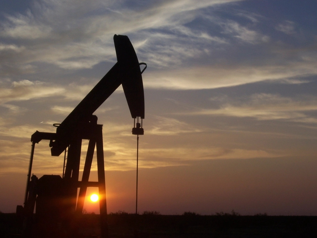 Oil pumpjack at sunset as oil prices Iran war fears ease