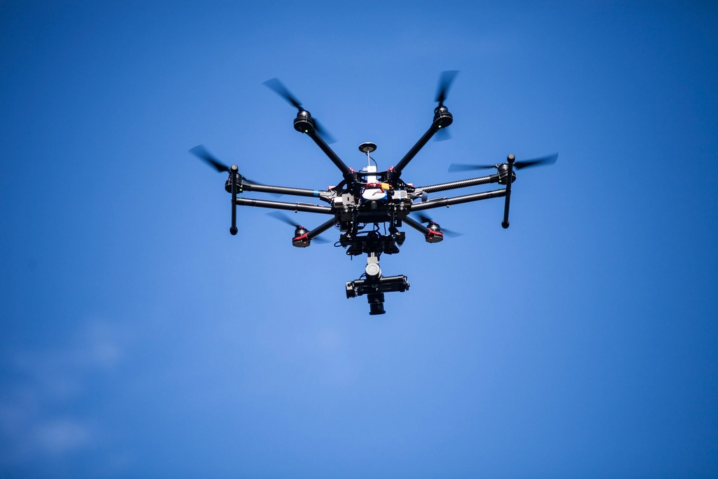 Drone silhouette against night sky, tied to the Russia drone warning Europe report
