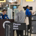 TSA checkpoint where travelers without ID now pay the TSA Real ID fee