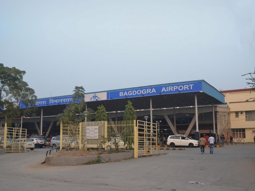 Airport terminal departure board representing the US flight delays surge