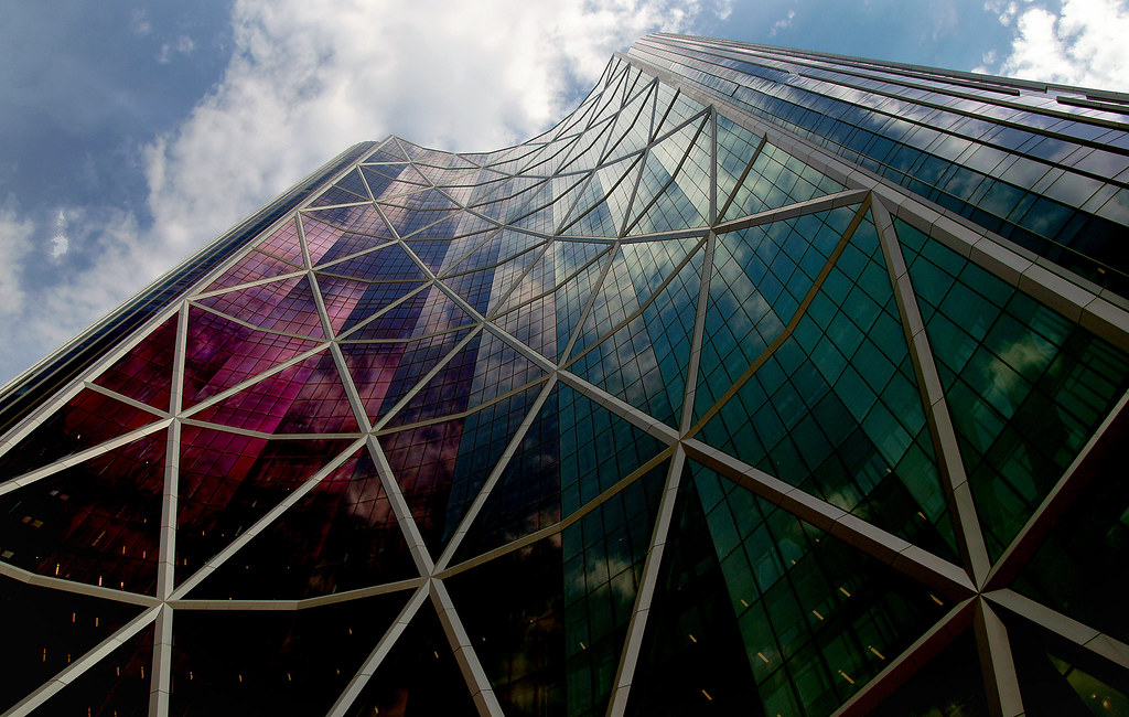 Apple OpenAI trade secrets: modern glass office tower