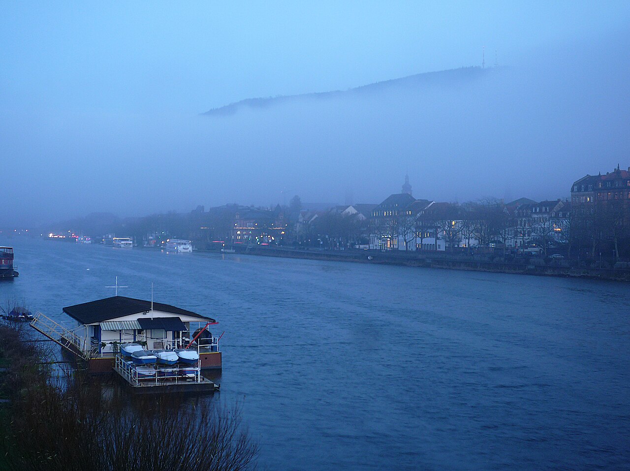 DAAD scholarship deadline - Heidelberg old town on the Neckar at dusk