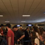 Airport passport control booth amid the ETIAS launch delay 2027