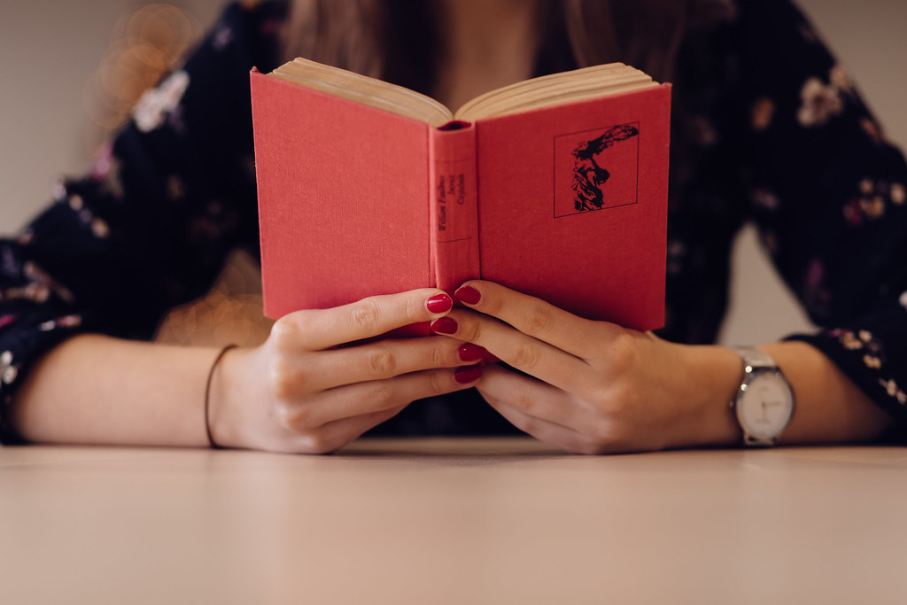 A student preparing documents, relevant to UK student visa funds requirements